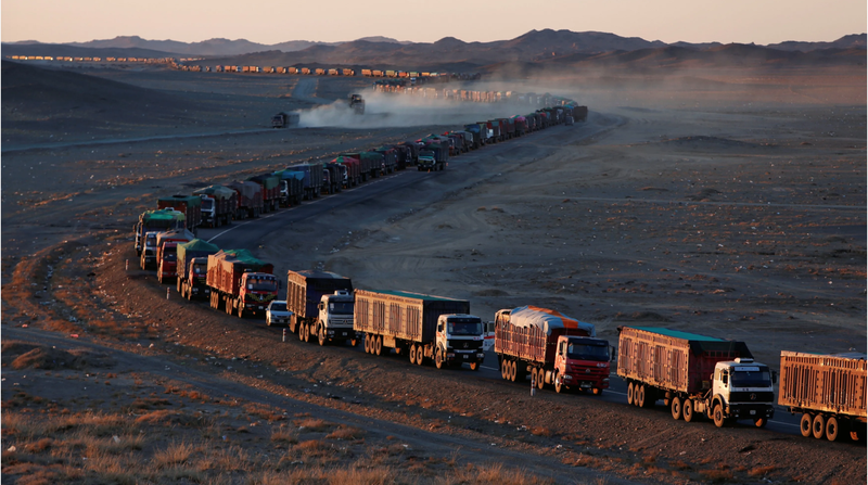 Coal trucks taking coal from Tavan Tolgoi to China, Source: Reuters
